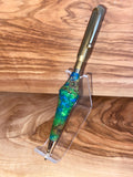 Unique Pen made with real flowers in epoxy and a brass 30-06 casing.