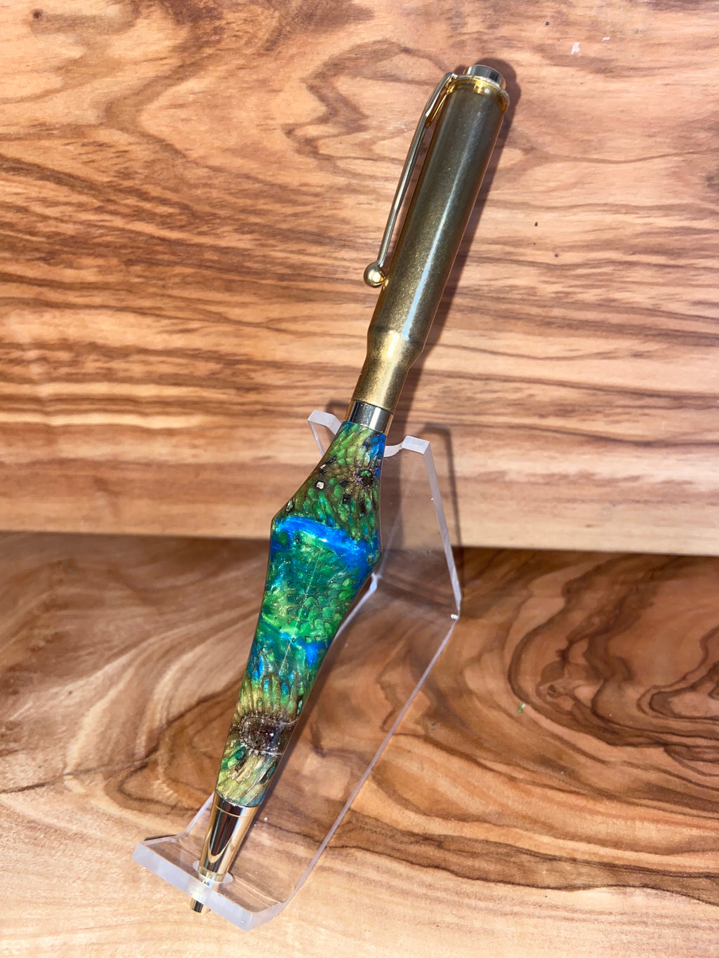 Unique Pen made with real flowers in epoxy and a brass 30-06 casing.