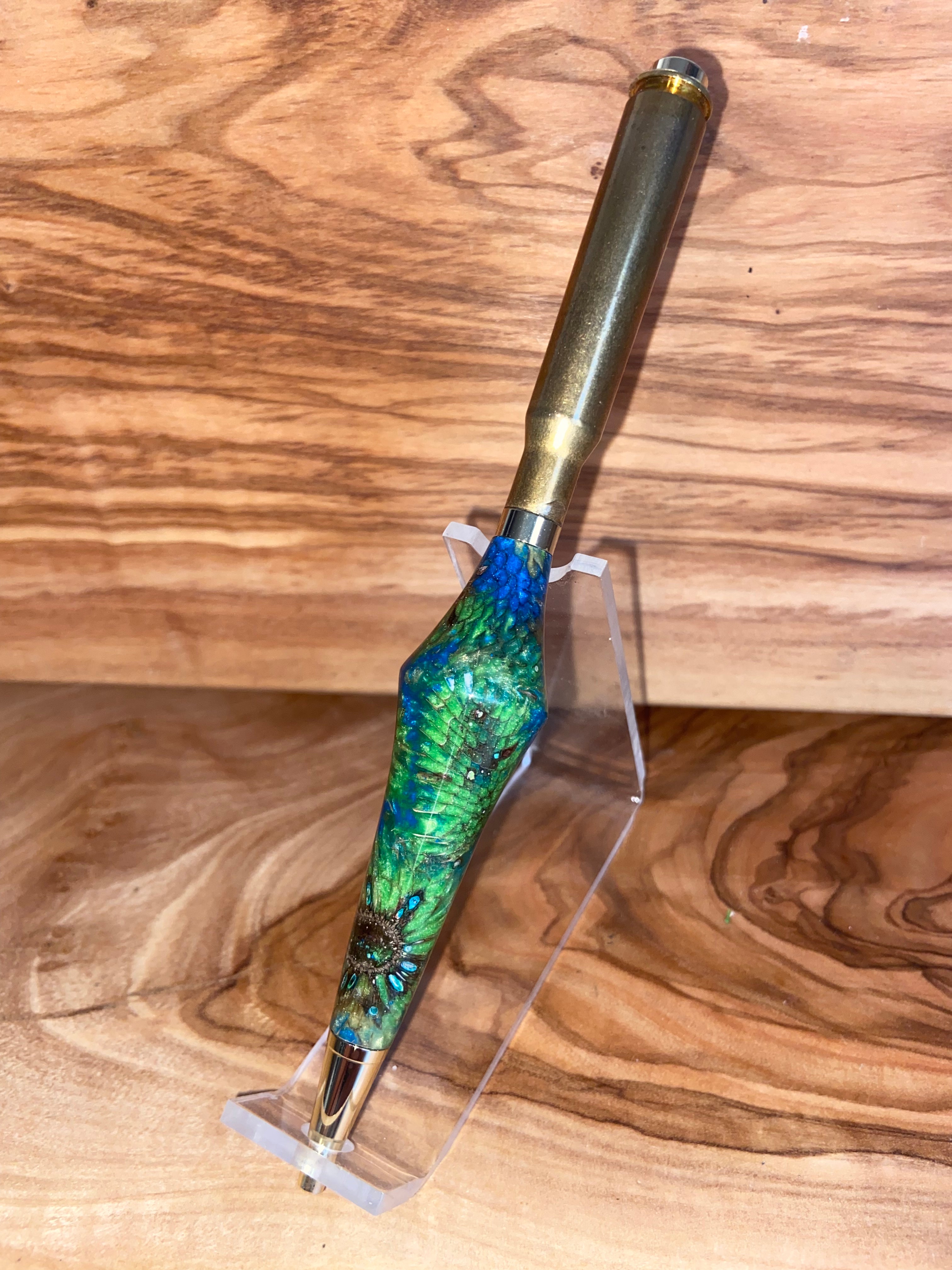 Unique Pen made with real flowers in epoxy and a brass 30-06 casing.