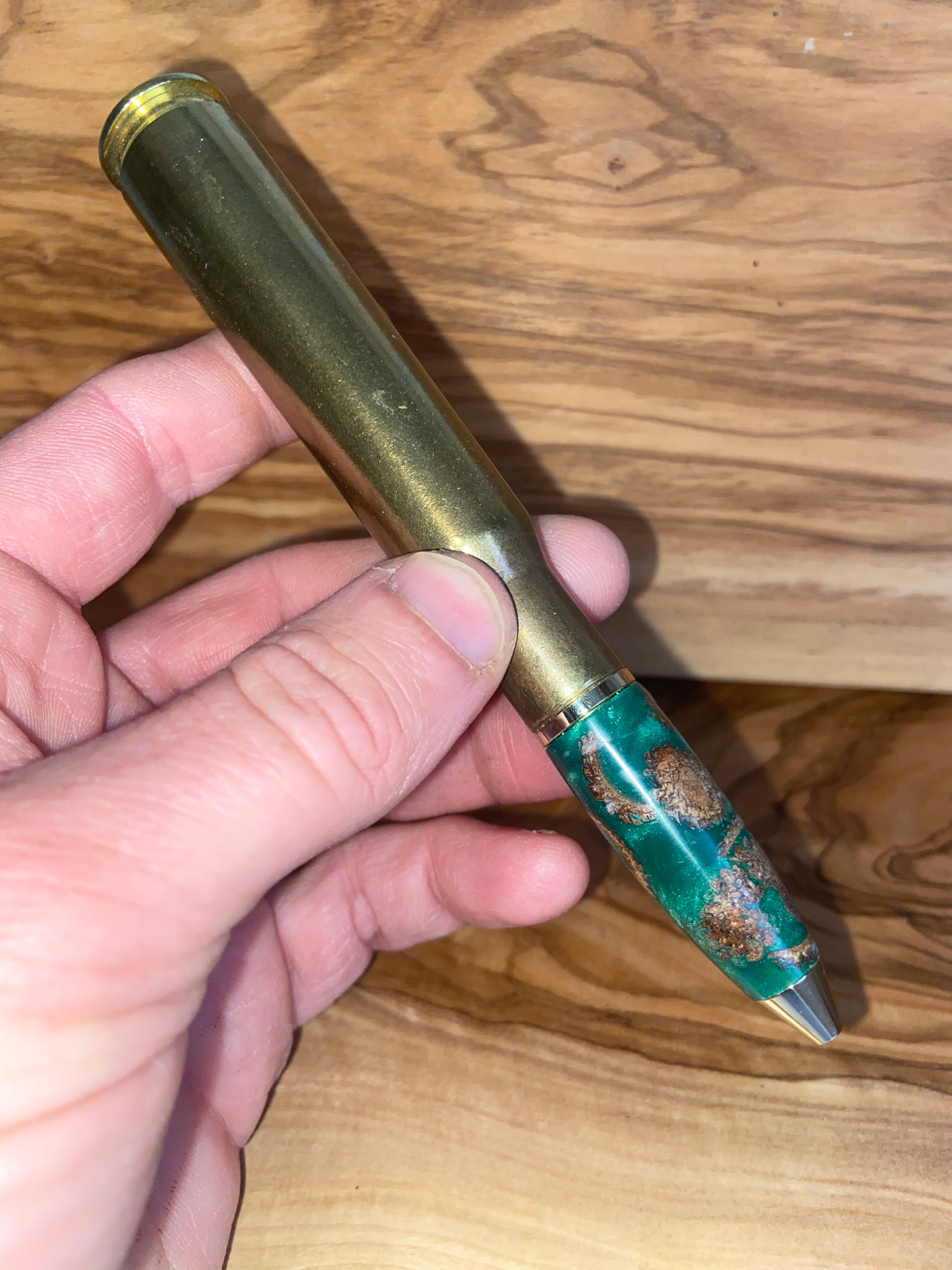 50 Caliber Themed Writing Pen - Acorn Caps in epoxy Bullet Design